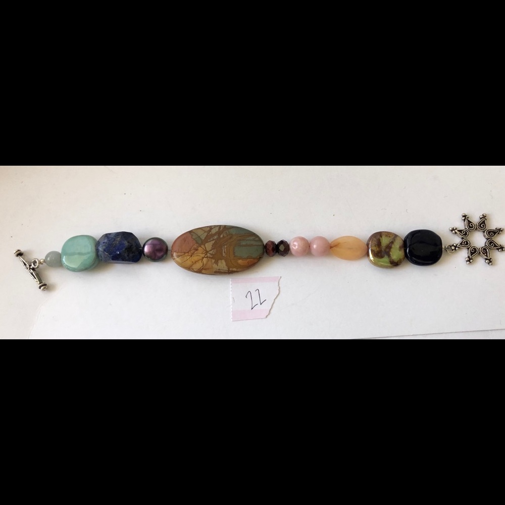 Segmented bead bracelet- brown pink orange blue 22